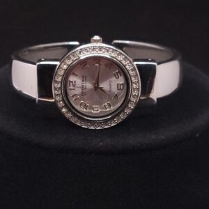silver-tone Prestige by Waltham quartz cuff watch with a rhinestone-encrusted